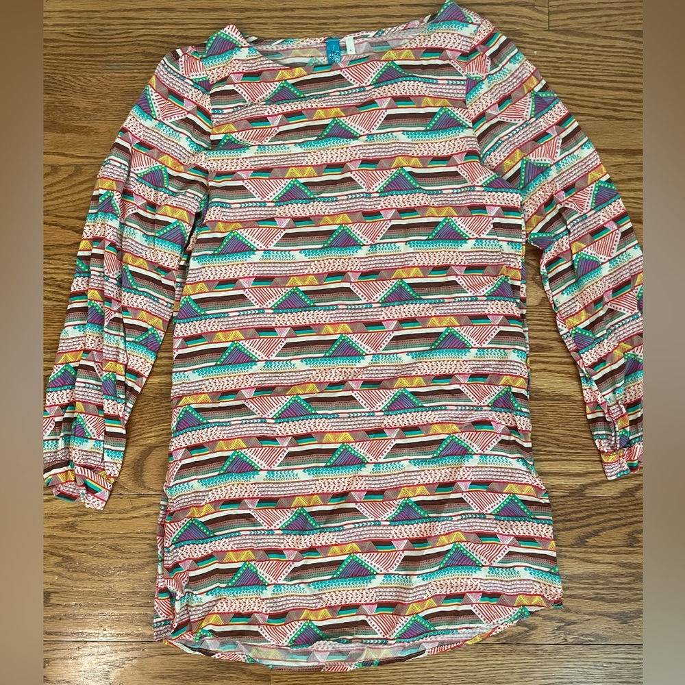 Never worn, really soft material, lots of fun colors.